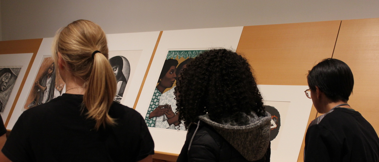 college students viewing artwork