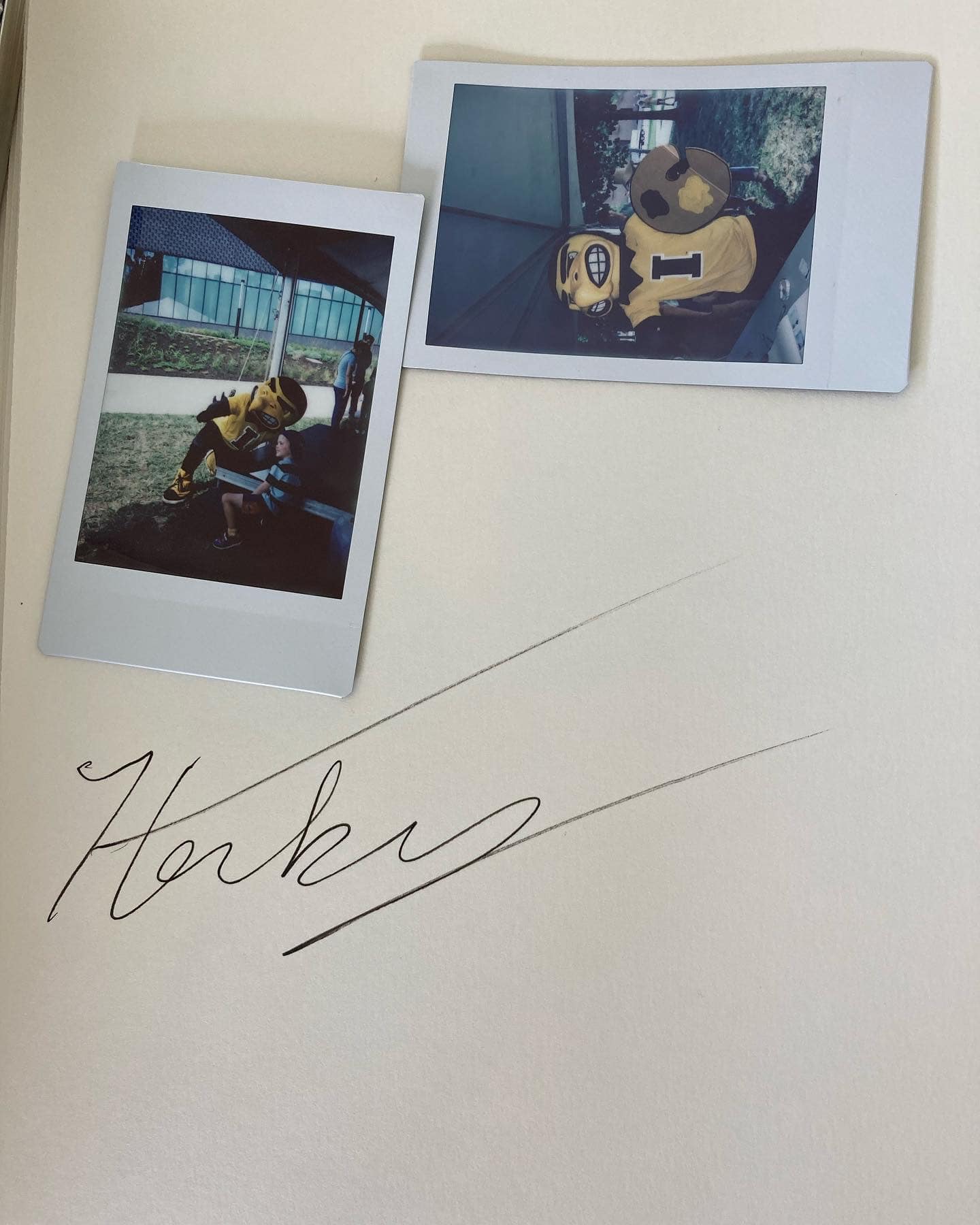 University of Iowa mascot Herky's signature and photo on the museum guest book