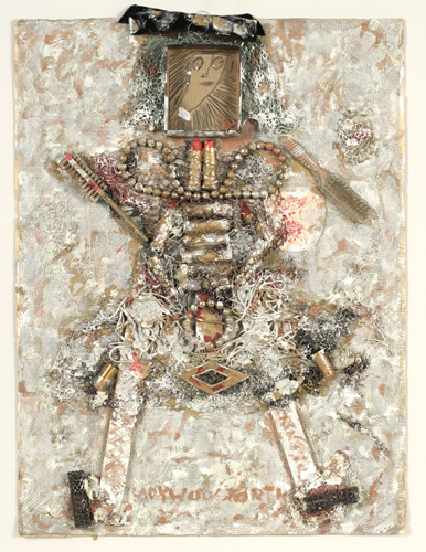 A human figure composed of found objects including lipstick tubes, jewelry, and hairbrushes, all smeared in white paint.
