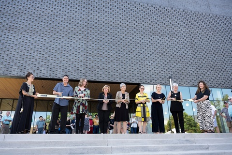 Students Philip Dixon (second from left), Lauren Smith (third from left), and Megan Dehner (third from right) assisted in the ribbon-cutting at the dedication for the Stanley Museum of Art.