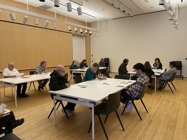 Participants of the workshop "Write at The Stanley" meeting in the visual classroom.