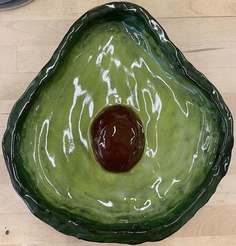 Grace's art: a ceramic dish glazed to look like an avocado.