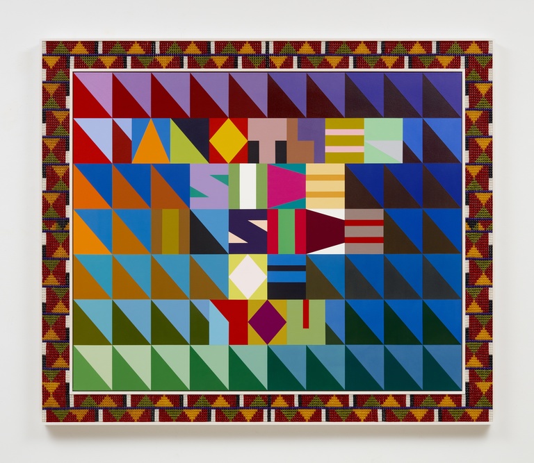 Geometric painting of colorful squares in varying tones on a canvas with a wooden frame. The phrase, "Another Side Inside of You," is discreetly visible in the square pattern.