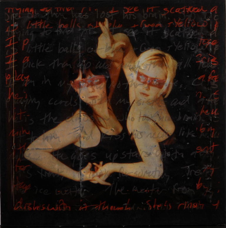 Two women in black tank tops standing together with their hands entwined, looking ahead. There is red and grey text overlayed on and around them, and red eye masks scribbled over their faces.