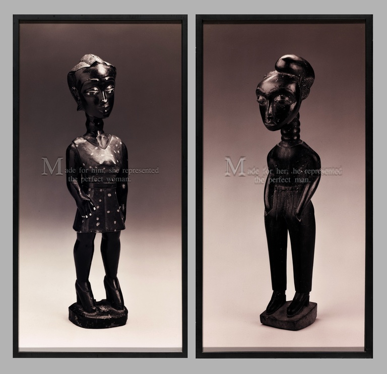 Two framed photos show carved wooden statues. The figure on the left has masculine features, with a feminine dress and heels on, and text overlayed on it that reads, "Made for him, she represented the perfect woman." The figure on the right depicts a feminine face with masculine pants on and text overlayed that reads, "Made for her, he represented the perfect man."