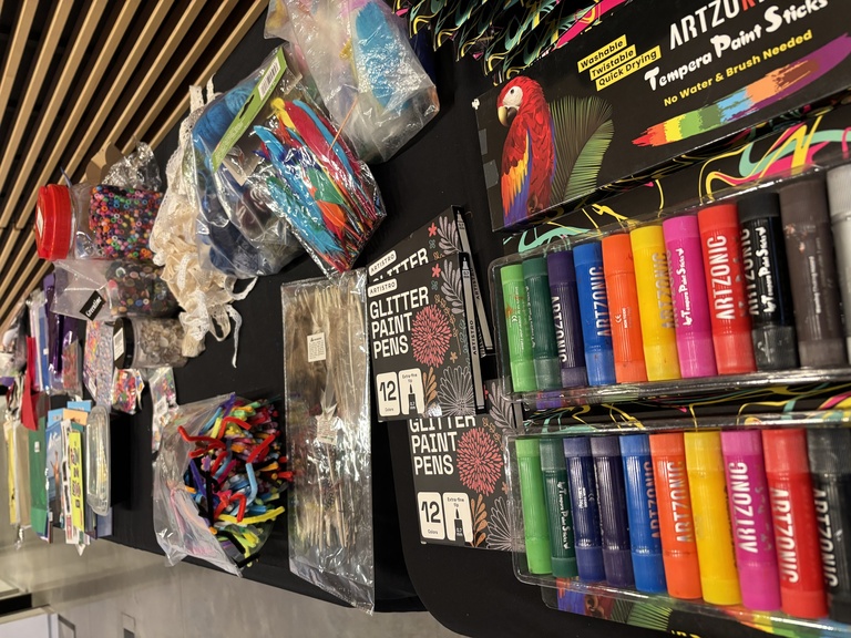 Supplies, including tempera paint, gel pens, collage materials, tissue paper, and more.