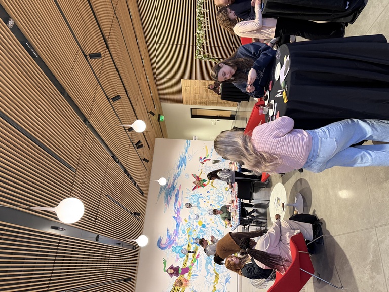 Students craft and eat snacks at the Date Night event