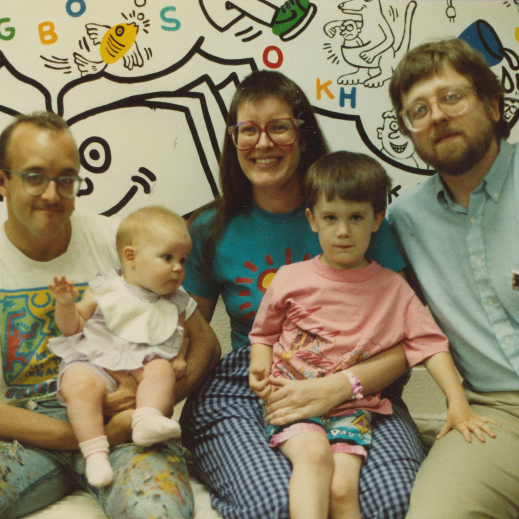 Keith Haring with Colleen Ernst, her husband, Bill Radl, and their two children, Sophie Radl (left) and Max Radl (right). Photographer unknown. Image courtesy of Colleen Ernst. © Keith Haring Foundation.