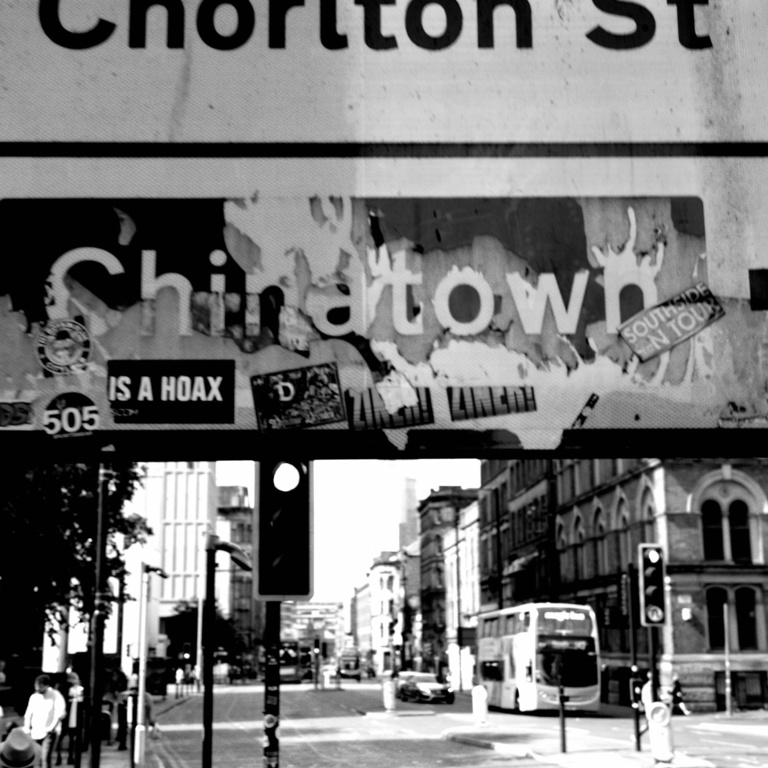 Graham's art: a black and white photo of a city sign.