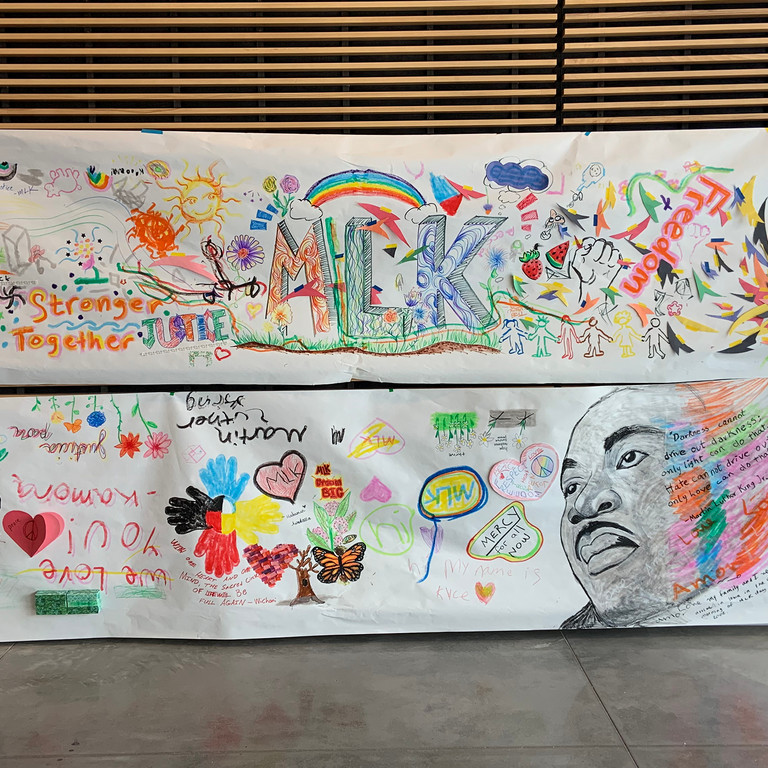 Two MLK murals, hung on the slatted wall in the Stanley's lobby.