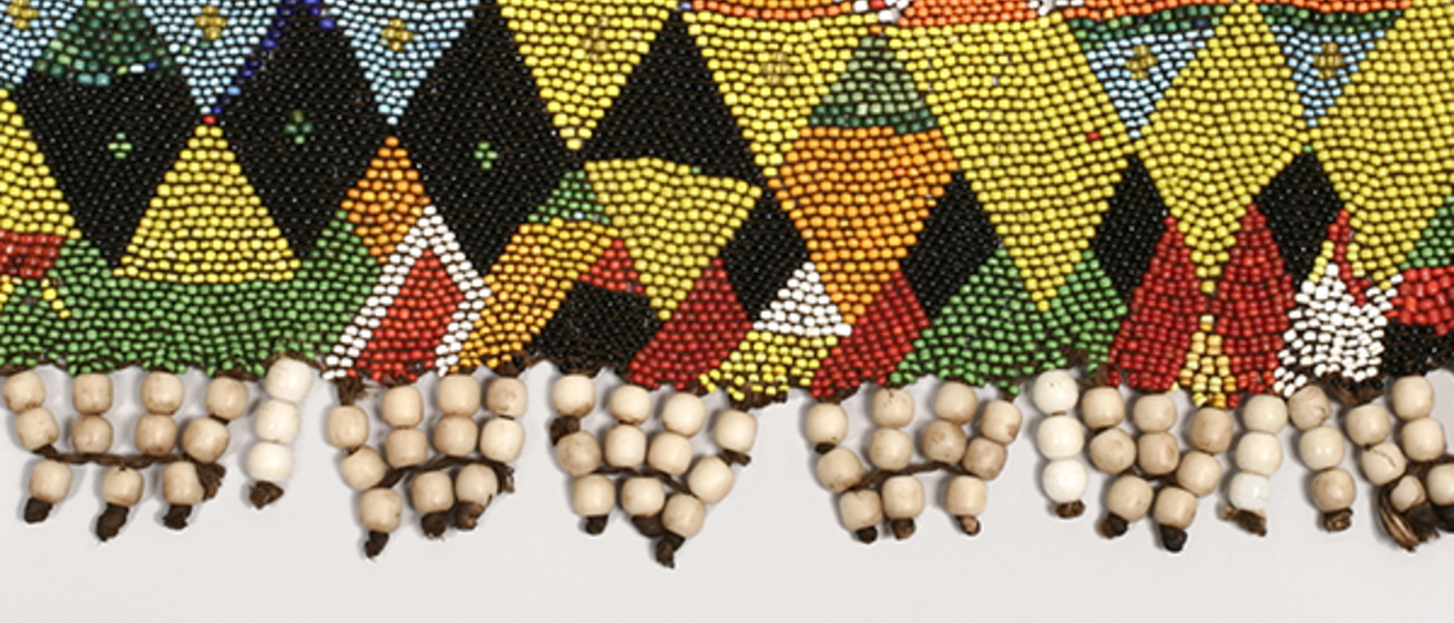 Detail image of a beaded apron