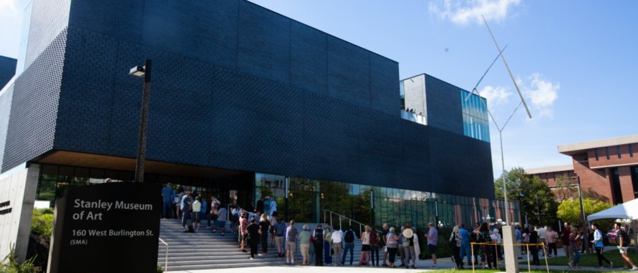 People line up to enter the Stanley Museum of Art at its opening celebration at the University of Iowa on Friday, Aug. 26, 2022.