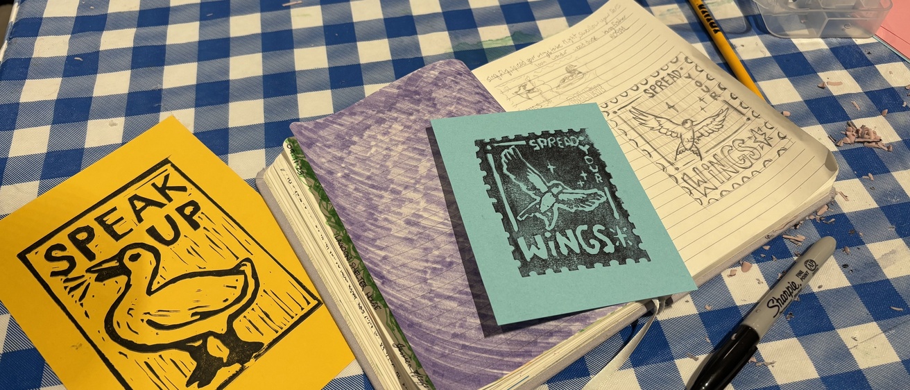 A photo of two prints made by student attendees.