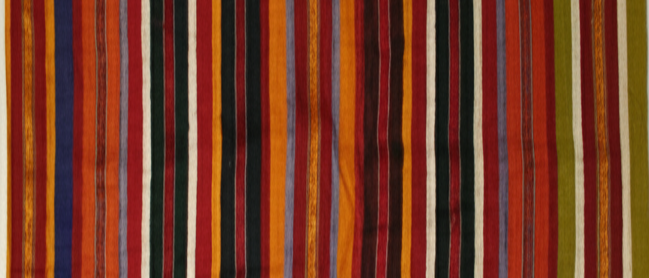 A vibrant striped fabric displaying a mix of colors