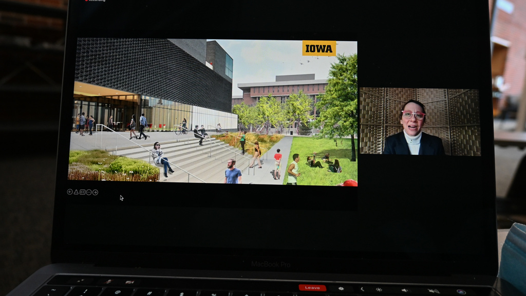 Laptop computer screen showing a Zoom presentation with architectural rendering of the Stanley Museum of Art and Director Lauren Lessing as speaker.