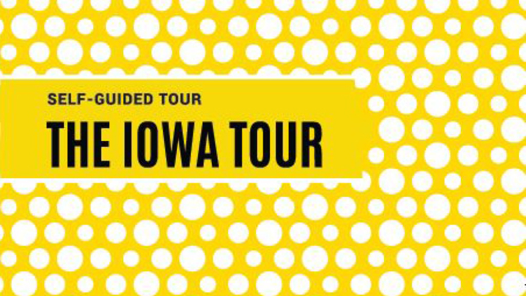 White dots on a yellow background with words "Self-Guided Tour: The Iowa Tour"