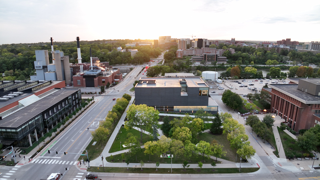 Aerial view of museum with campus recreation center on left and Main Library on right