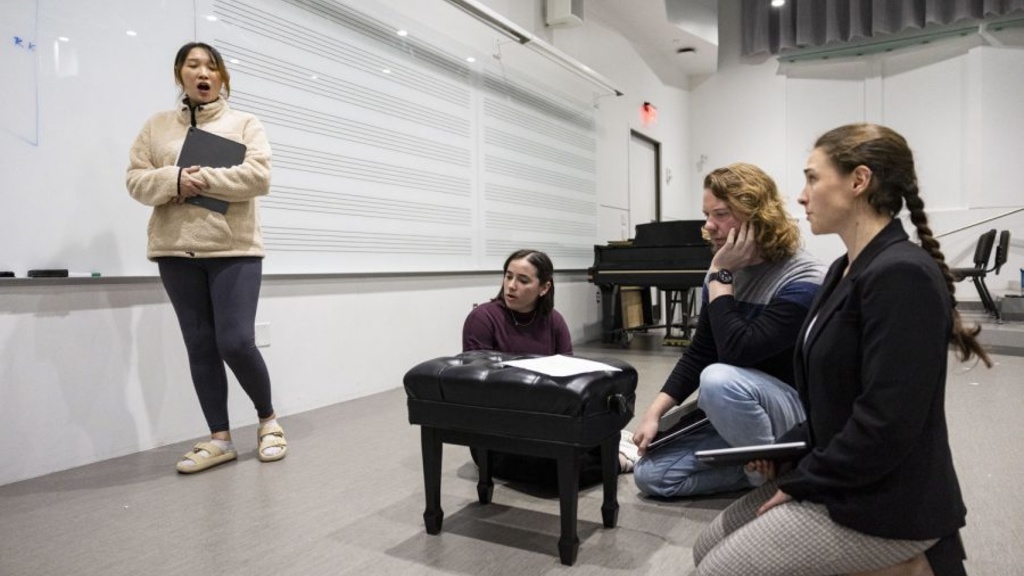 Siyeon Kim, Rachel Kobernick, Nathan Brown, and Jordan McCready perform during a dress rehearsal of the opera “The Great Flood” at the Voxman Music Building on Monday, April 24, 2023. Nathan Felix is the composer of the opera and it will premiere at the Stanley Museum of Art on Thursday, April 27.