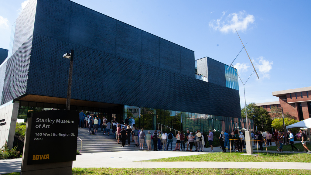 People line up to enter the Stanley Museum of Art at its opening celebration at the University of Iowa on Friday, Aug. 26, 2022.