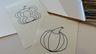two abstract pumpkin outlines on white pieces of paper 